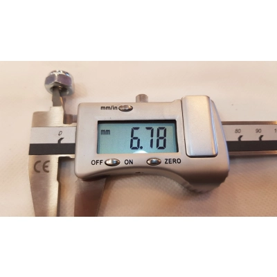 Nakrętka samokontrująca do osi w widełkach wózka (kółko obrotowe przednie)