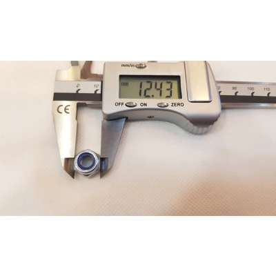 Nakrętka samokontrująca do osi w widełkach wózka (kółko obrotowe przednie)